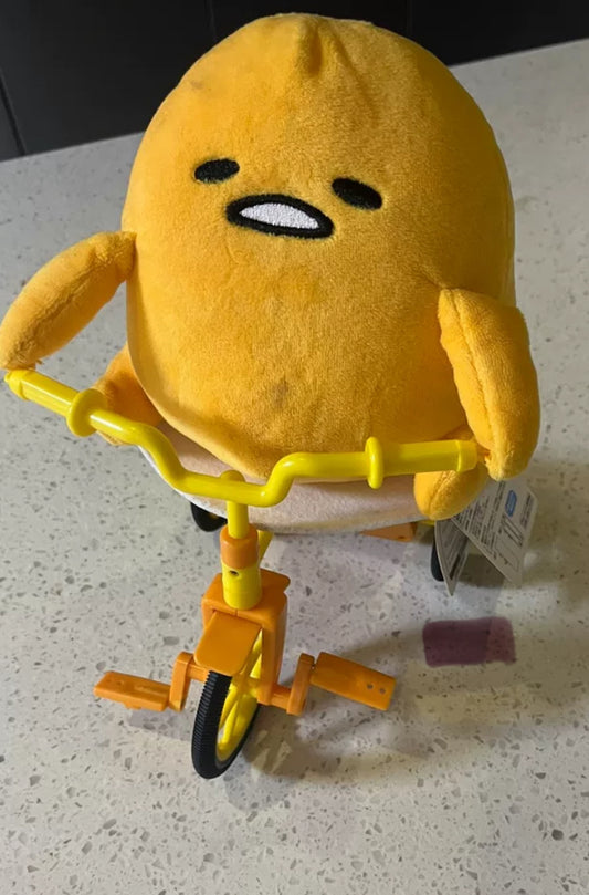 Gudetama riding bike